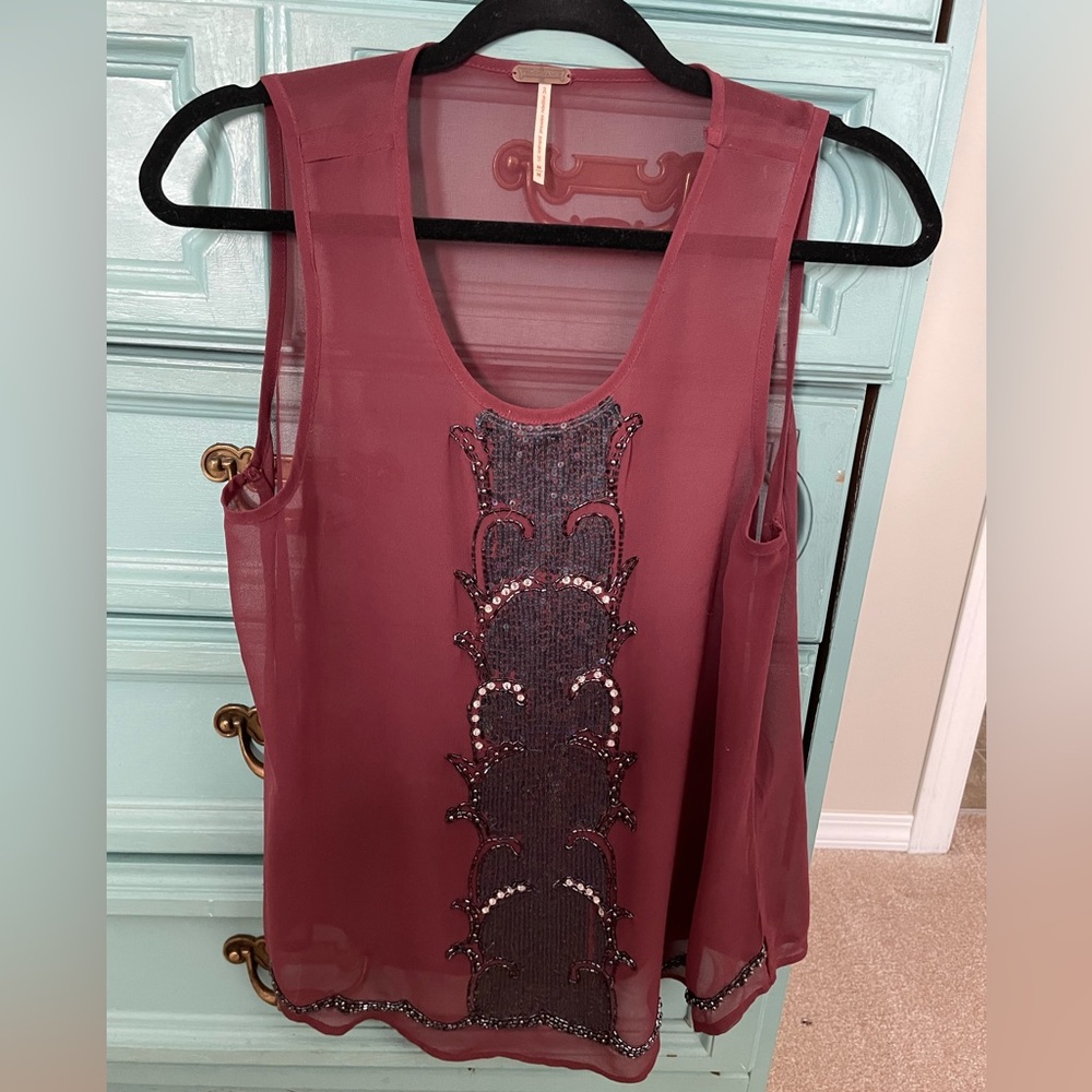 Size M Temperance sheer top.